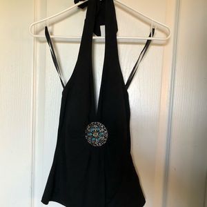 Caché black halter top with beautiful pin attached